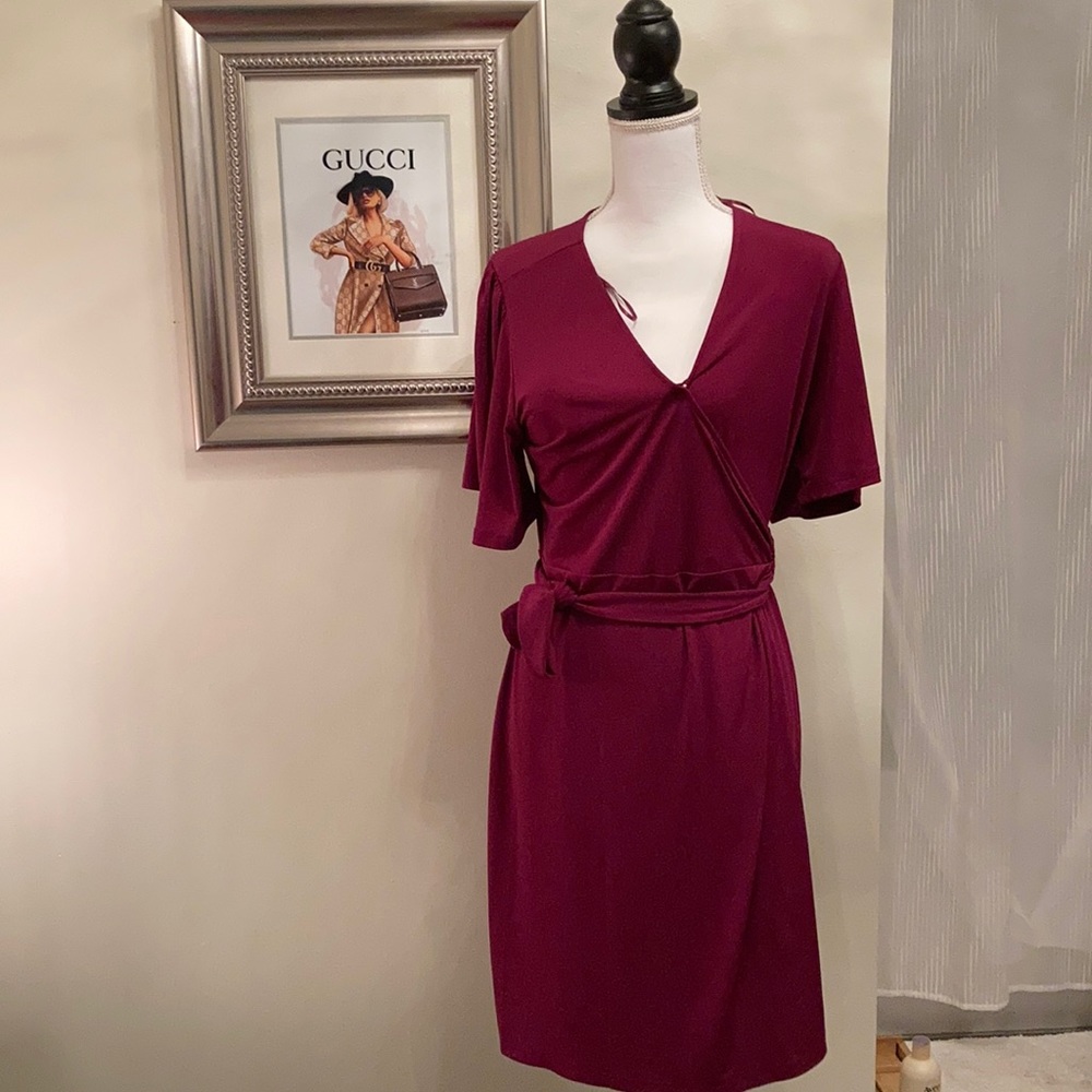 Brand new dress worn once to wedding.